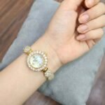 ساعة نسائية ذهبية فاخرة مرصعة بالكريستال